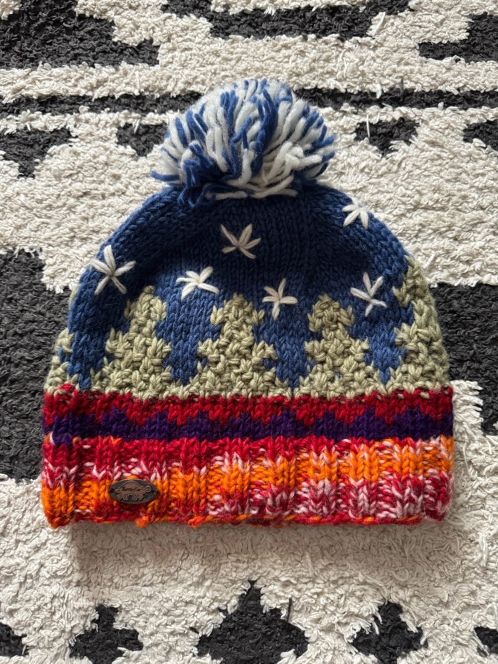 Turtle Fur Multicolor Pom Pom Knit Beanie